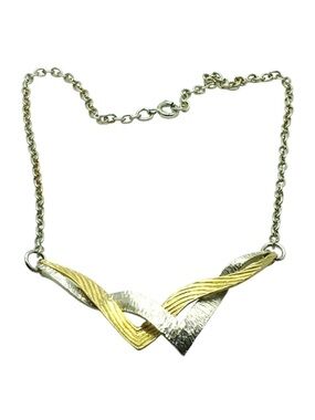 Vintage Michele Lynn Choker Necklace
Silver & Gold Tone
15 “
1970